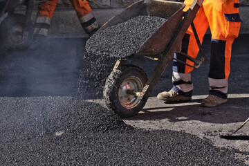 Paving the road with porous asphalt for traffic noise.reduction in Geneva, switzerland