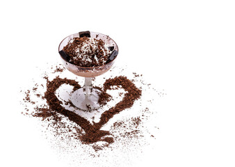 Sweet ice cream in a glass sprinkled with chocolate chips.