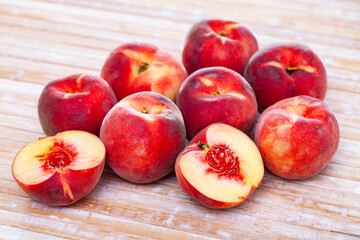 Fototapeta na wymiar Image of sweet juicy peaches fruit on wooden surface close up
