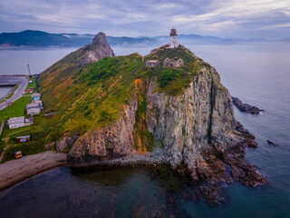 Above. Rudny lighthouse at Cape Briner in the village of Smychka (Rudnaya Pristan), Primorsky Territory. The beautiful Rudny lighthouse stands on a sheer cliff against the backdrop of a bright dawn