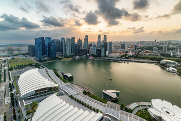 Fototapeta premium Aerial view of Marina Bay and skyscrapers at sunset, Singapore