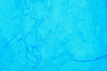 Turquoise wall with marble pattern. Stone surface texture background