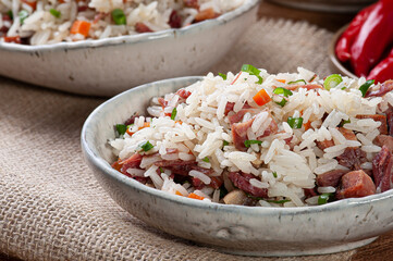 Arroz de Carreteiro - Typical food from southern Brazil, made with rice, dried meat, pepperoni sausage, bacon and carrots.