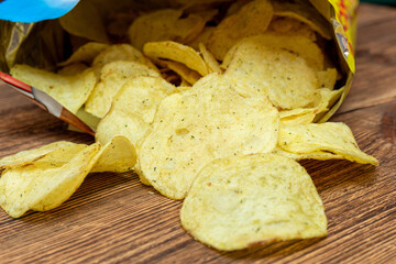 yellow potato chips in a packet close up