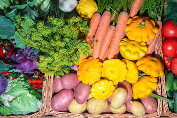 Fresh vegetables top view. Vegetables in wicker baskets. Vegetable store window. Food sales. Agricultural business. Farmer's harvest. Environmentally friendly product.