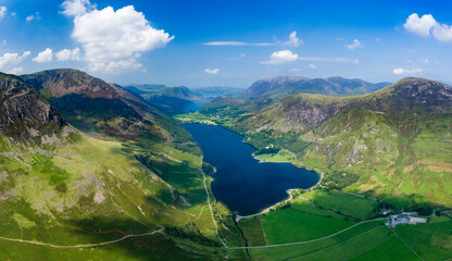 Fototapeta na wymiar Panoramic aerial view of a beautiful lake and narrow valley (Buttermere, Lake District, England)