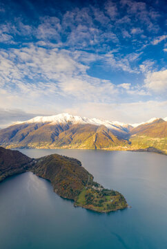 Aerial panoramic of Piona Abbey (Abbazia Priorato di Piona) and mountains, Lake Como, Colico, Lecco province, Lombardy, Italian Lakes