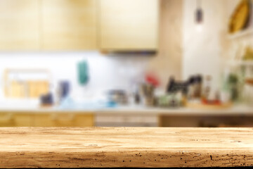 Wooden desk and kitchen interior 