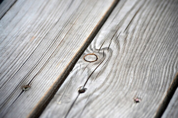 Wooden planks with knots and cracks, diagonal