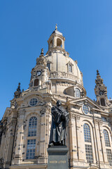 Fototapeta na wymiar close up view of Martin Luther statue and Frauenkirche in Dresden