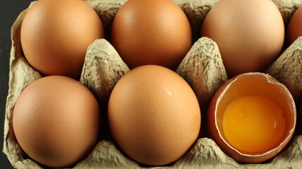 Brown eggs in a carton box