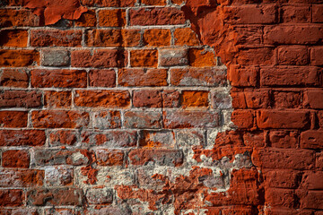 background - old dilapidated red brickwork.