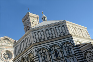 The Cathedral of Santa Maria del Fiore is a symbol of Florence with the dome of Brunelleschi, the bell tower of Giotto and the Baptistery of San Giovanni.