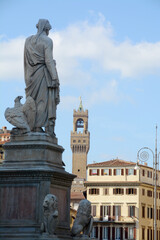 The statue of Dante Alighieri, author of the Divine Comedy, in front of the Basilica of Santa Croce in the heart of Florence.