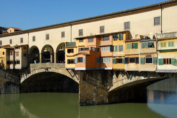 Fototapeta na wymiar The Ponte Vecchio on the Arno River is one of the symbols of the city of Florence and one of the most famous bridges in the world.