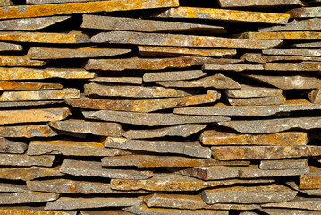 Texture of brick wall and concrete blocks. Samples of stone plates stacked evenly in a row.