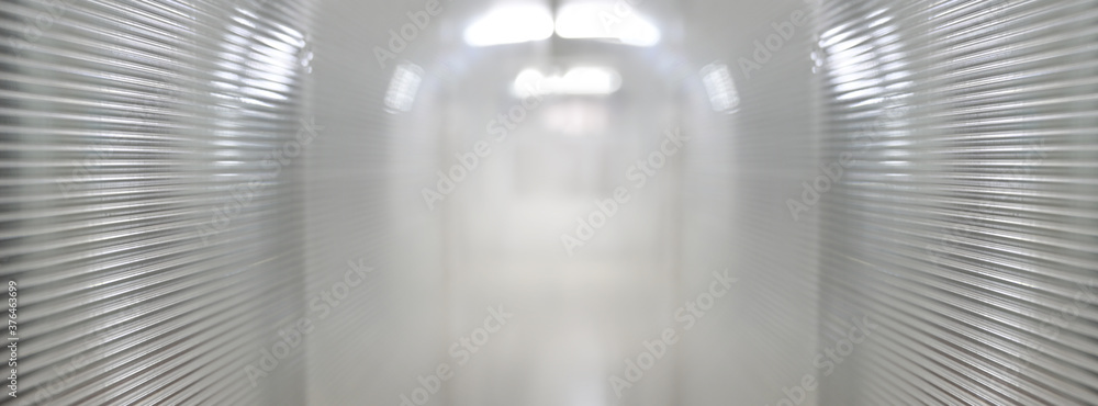 Aufkleber blurred empty abstract hospital corridor pathway white soft blue background from perspective buildin
