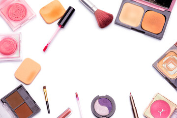 Cosmetics and make-up accessories that have been used Placed on a white table top view