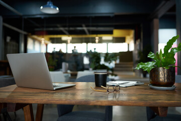 Items sitting on a desk in an office after work