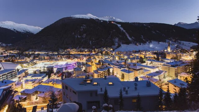 DAVOS, SWITZERLAND city night timelapse in winter.