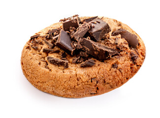 Chocolate chip cookie with chocolate pieces and shavings, isolated on white background. Cookie close-up