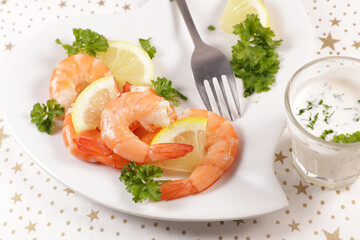 shrimp snack with fresh yogurt sauce and herbs