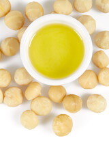 macadamia nut oil isolated on white backrgound