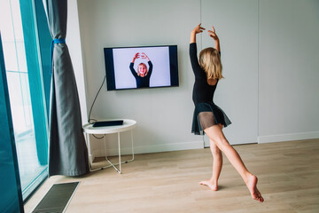 Ballet or gymastics lesson online. Remote learning for kids.