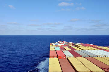 View on deck of container ship, during her passage through the ocean. 