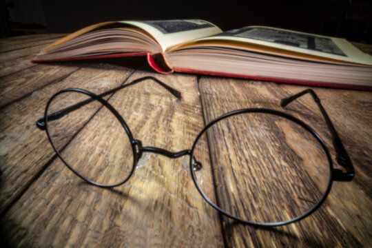 reading glasses and book - soft focus image shot with a lensless pinhole camera