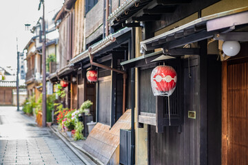 A paper lantern at a machiya home in Kyoto Japan. Beautiful architecture in Gion, the historic...