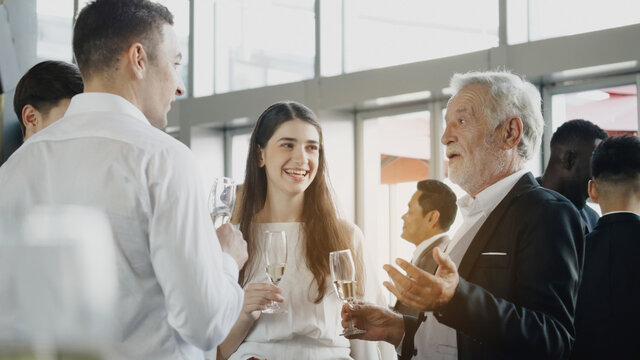 Multi-ethnic People Or Businessman Party Talk At Company Event. Celebrate A Success Workplace. Meeting Happy Between Colleagues. End Of Quarantine And Return To Work Business