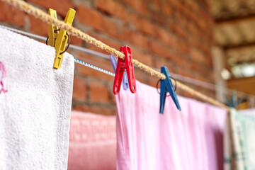 Clean Laundry is dried on a rope. Laundry is dried outside. Laundry of household linen.