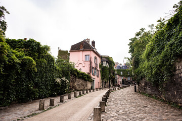 In Paris France, view of Rue de l'Abreuvoir, a charming and historic street in the Montmartre...