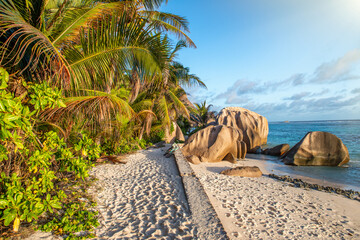 Granite Rocks of Seychelles Islands with beautiful background sky at sunset, Africa