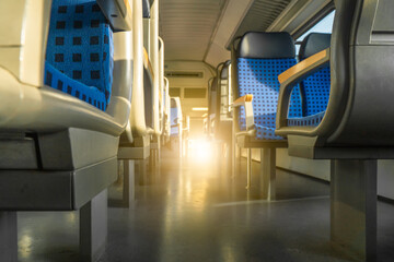 Obraz premium Clean hygiene empty seat on europe Germany public transportation train subway bus with sunlight for traveler to travel during vacation with nature view on window
