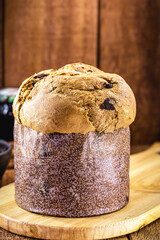 traditional christmas bread from brazil and italy, called panettone or chocotone, made at home, stuffed with clocolate