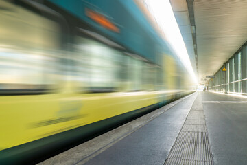 Abstract background travel of public transportation with blur speed motion movement of train  on railway tunnel subway