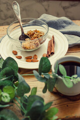 Pear crumble pie. Fruit Crumble with Any Kind of Fruit. Dessert with fruits, oatmeal and almonds server glass bowl. Crispy pastry cake and cup of black tea..Morning breakfast