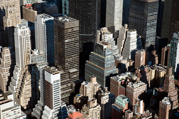 Detailed aerial shot of famous New York skyscrapers, impressive vertical architecture and real estate portfolio, headquarters of the most iconic businesses and brands in the world, Manhattan, NYC, USA