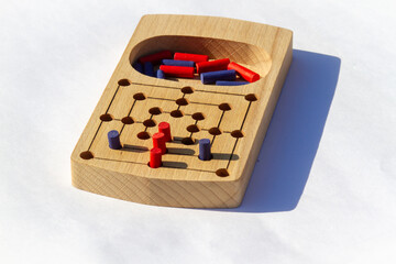 Wooden board game  with a winning move 