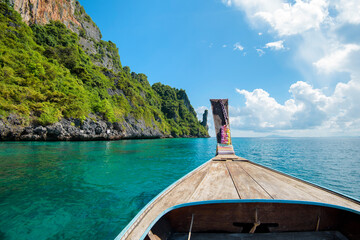 View of thai traditional longtail Boat over clear sea and sky in the sunny day, Phi phi Islands,...