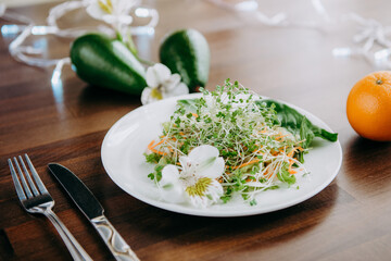 field raw food meal on a white plate