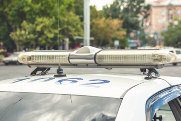 Fototapeta premium Police cars with the siren lights off on patrol mission