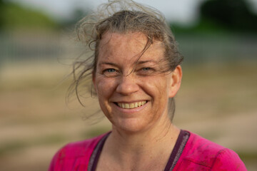 Portrait of woman smiling at boot camp