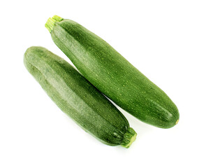 fresh green zucchini with slice isolated on white background