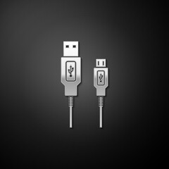 Silver USB Micro cables icon isolated on black background. Connectors and sockets for PC and mobile devices. Smartphone recharge supply. Long shadow style. Vector.