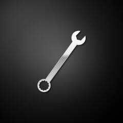 Silver Spanner icon isolated on black background. Long shadow style. Vector.