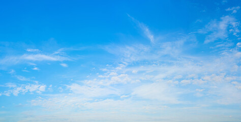 Fototapeta premium White clouds in the blue sky. Light heavenly background. Natural background.