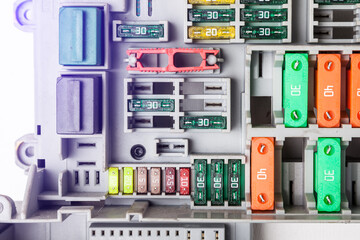Detail of a car engine bay with fuses. Auto service industry. Repairing car.